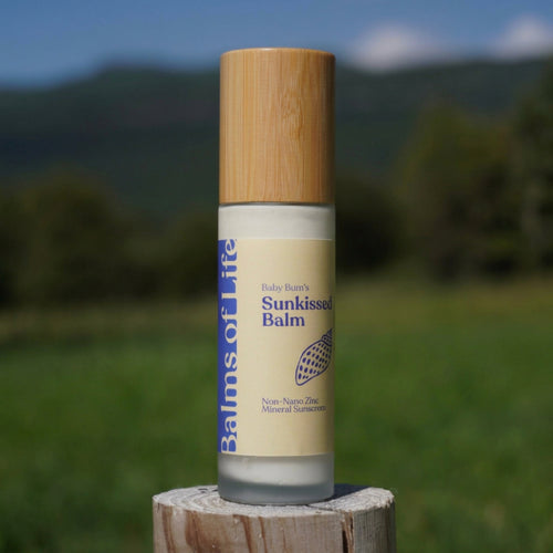 Sunkissed Balm bottle in natural light