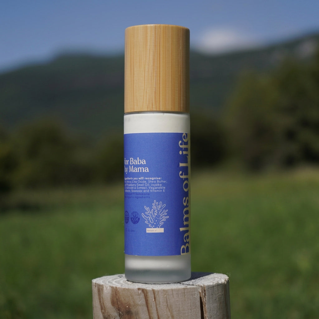 Sunkissed Balm bottle on wooden post